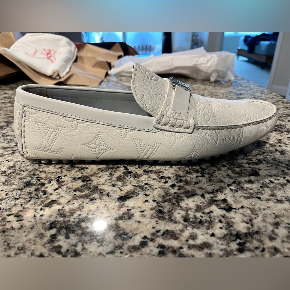 Louis Vuitton men’s size 10.5 white moccasin loafers